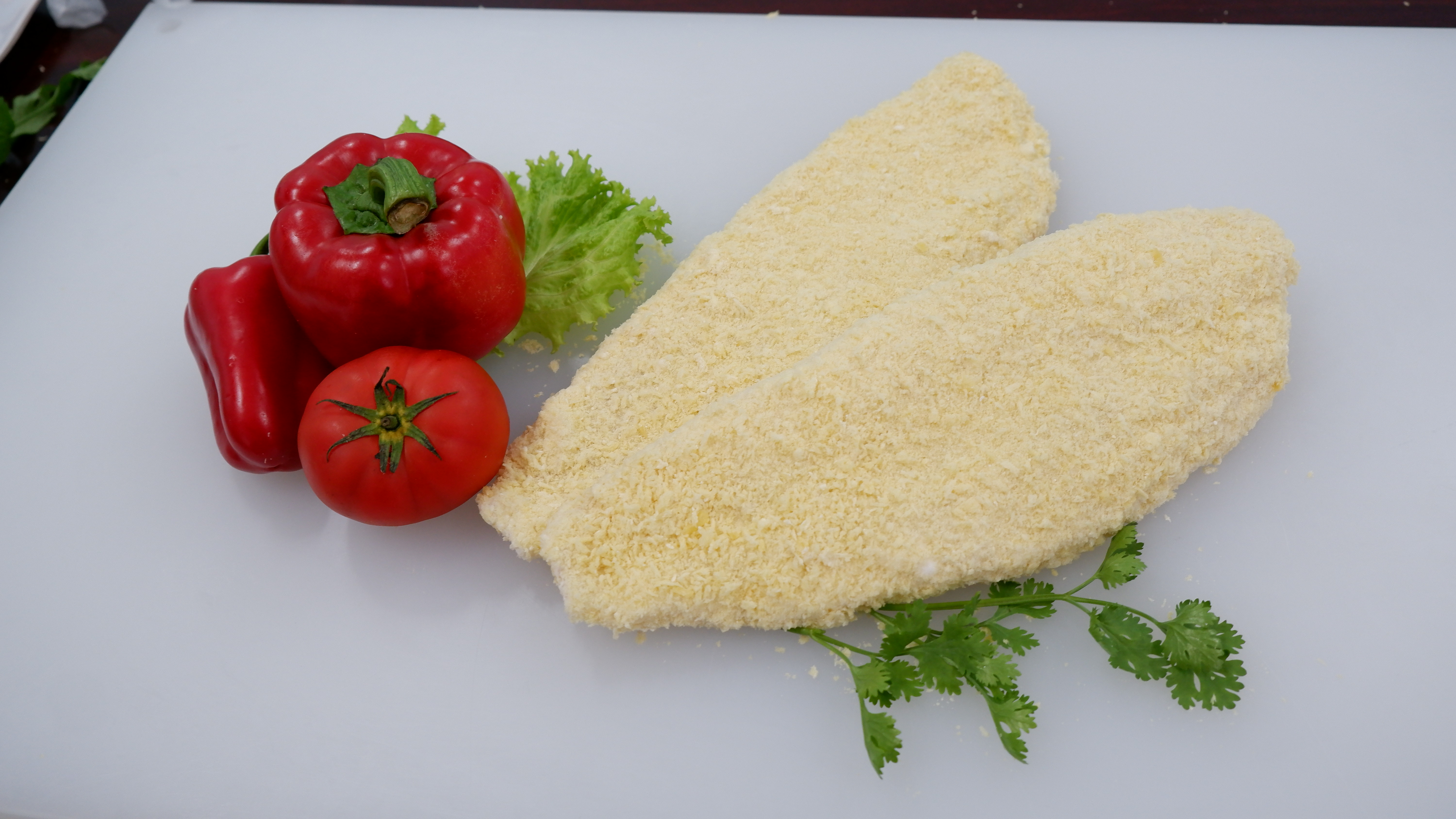 <span  class="uc_style_uc_tiles_grid_image_elementor_uc_items_attribute_title" style="color:#ffffff;">Breaded Pangasius Fillet</span>