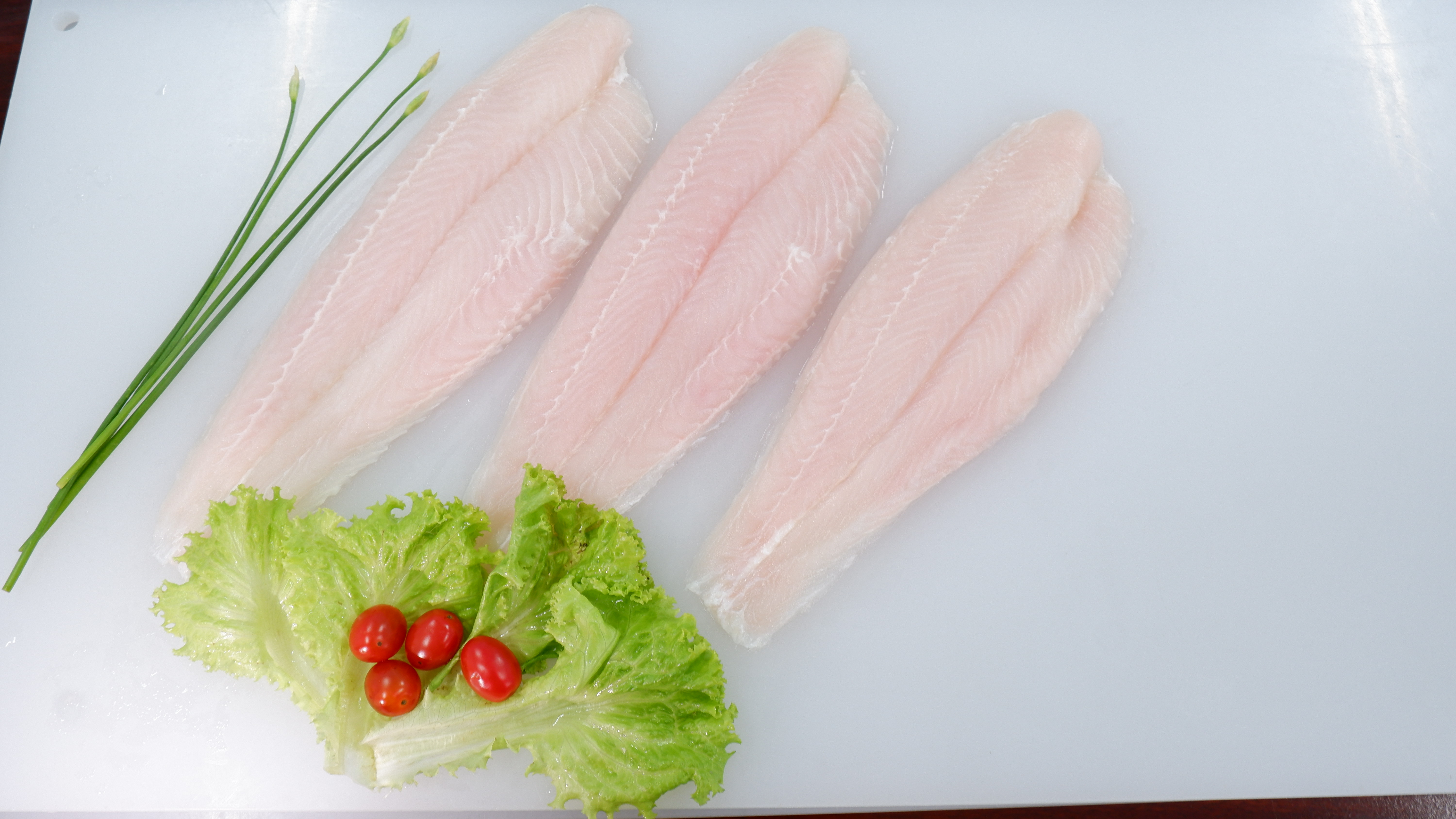 <span  class="uc_style_uc_tiles_grid_image_elementor_uc_items_attribute_title" style="color:#ffffff;">Pangasius Fillet Well-trimmed</span>