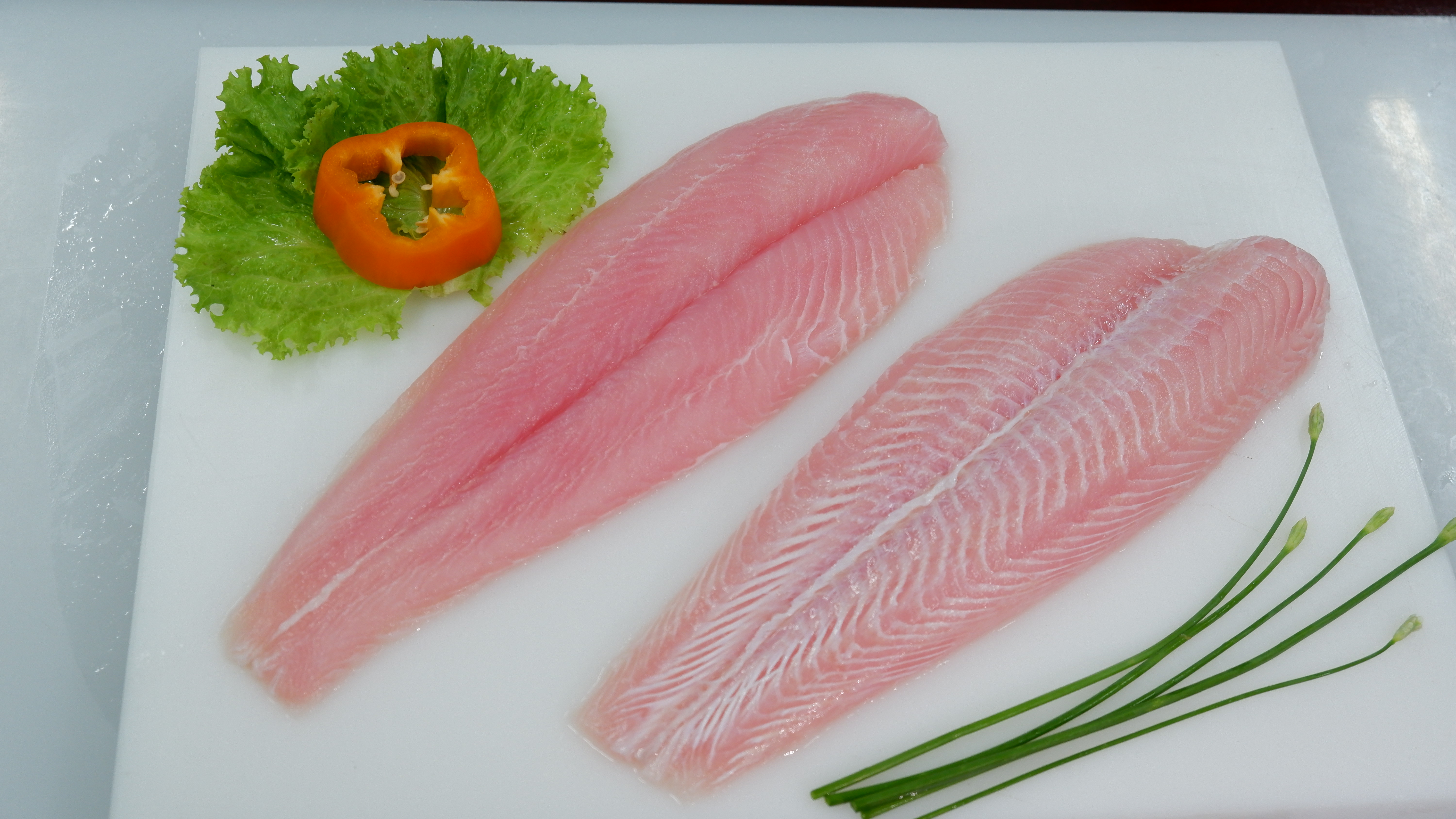 <span  class="uc_style_uc_tiles_grid_image_elementor_uc_items_attribute_title" style="color:#ffffff;">Pangasius Fillet with CO treatment</span>